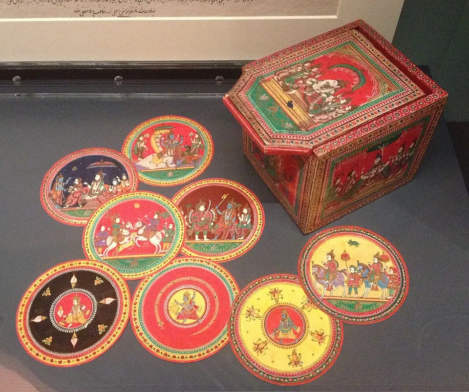 A Dashavatara ganjifa set from Sawantwadi, with its painted box.